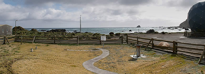 Photograph of Macquarie Island weather station located on island shore-line
