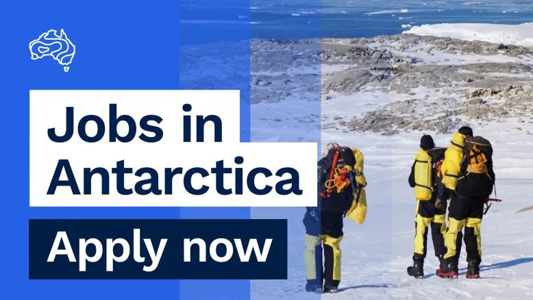 People in cold weather gear walk across an icy landscape with the ocean in the distance. Text says Jobs in Antarctica, apply now.