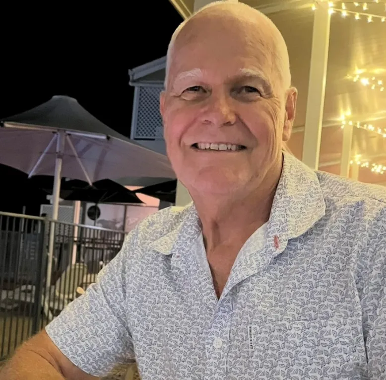 Photographer Glenn Keane smiles at the camera.