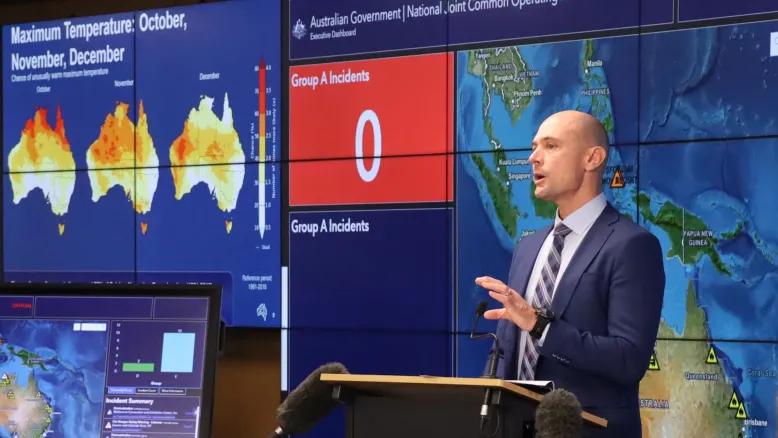 Bureau of Meteorology spokesperson gives a briefing in the National Situation Room.