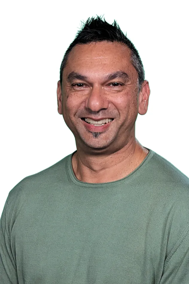 Headshot of Karl Braganza.