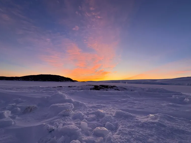 Pink and orange sunset over Antarctica.